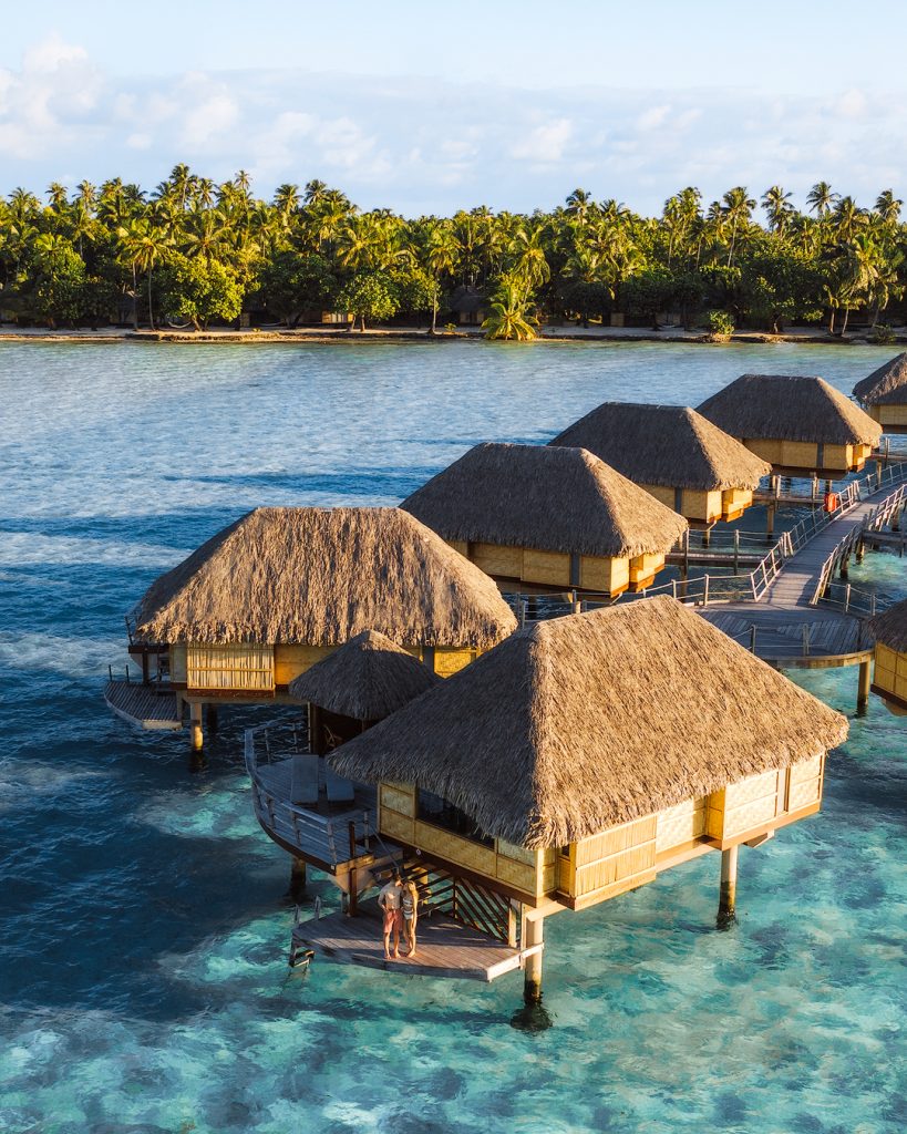 How To Take Stunning Travel Photos as a Couple - Renee Roaming - Le Tahaa Tahiti Drone