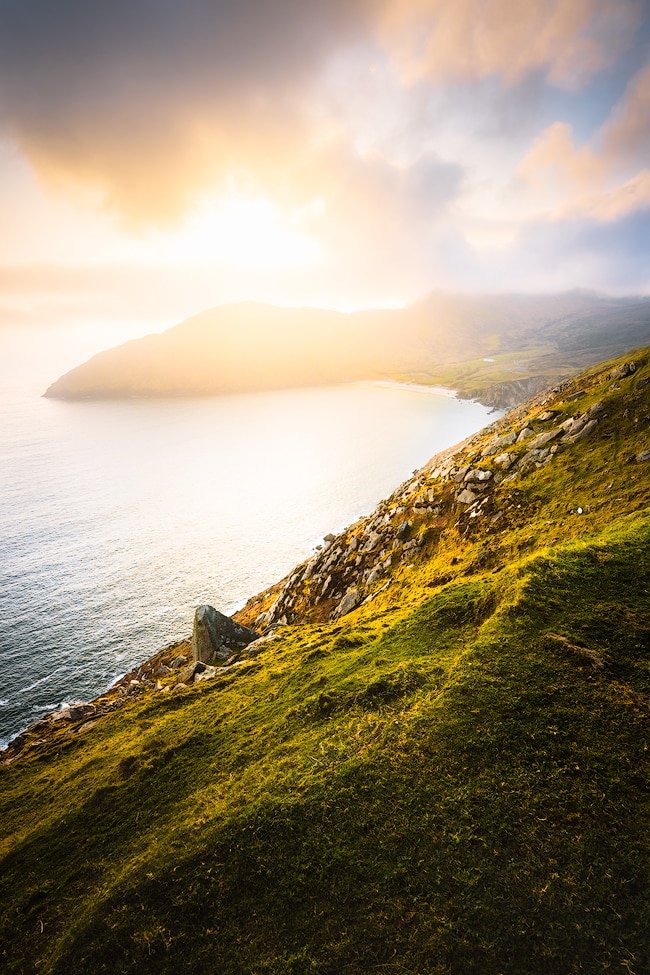 Achill Island | Ireland's Wild Atlantic Way is a breathtaking coastal route that's bursting with things to do, spectacular views, castles, and quaint towns. Find out some must-see stops for a week long Wild Atlantic Way road trip, starting in Dublin and ending near Galway! By Renee Roaming, your course for trip inspiration, destination guides, and dreamy travel photography. 