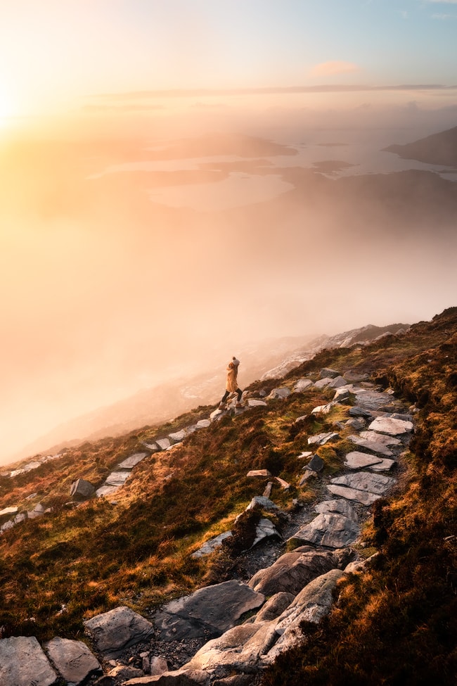 Connemara National Park hike - Ireland's Wild Atlantic Way is a breathtaking coastal route that's bursting with things to do, spectacular views, castles, and quaint towns. Find out some must-see stops for a week long Wild Atlantic Way road trip, starting in Dublin and ending near Galway! By Renee Roaming, your course for trip inspiration, destination guides, and dreamy travel photography. 