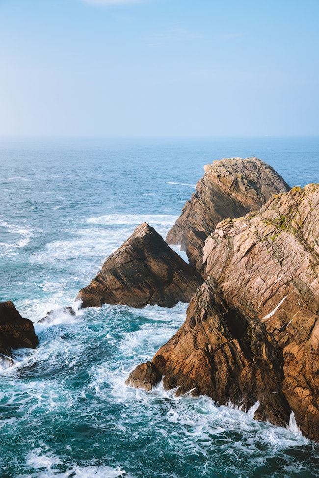 Erris Head Loop Hike | Ireland Wild Atlantic Way is a breathtaking coastal route that's bursting with things to do, spectacular views, castles, and quaint towns. Find out some must-see stops for a week long Wild Atlantic Way road trip, starting in Dublin and ending near Galway! By Renee Roaming, your course for trip inspiration, destination guides, and dreamy travel photography. 