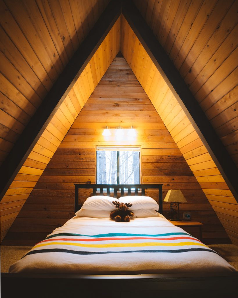 Cozy Cabins to Rent in Washington State - Foss Haus Cabin Bedroom - Renee Roaming