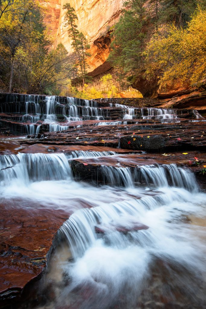 12 Best National Parks To Visit In The Fall - Zion National Park Subway Hike Waterfall